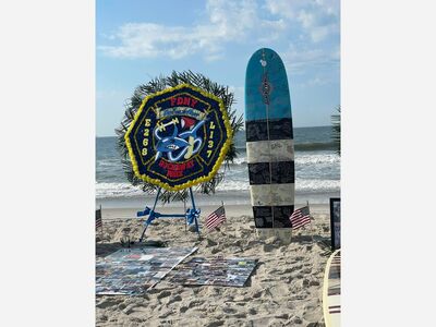 A Humble Hero is Honored in a Paddle-Out at Lido Beach
